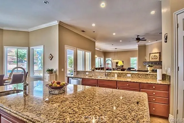 a living room with granite countertop chairs and rug