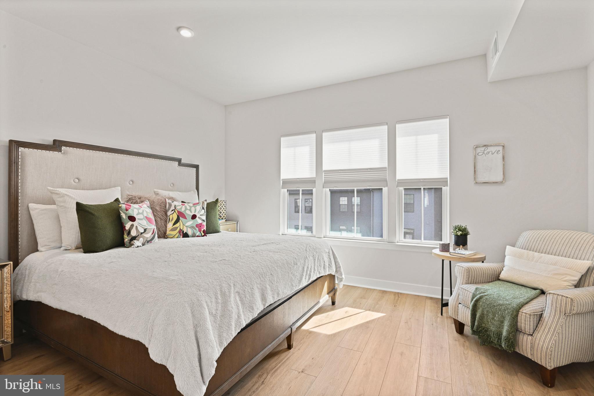 14008 Airfoil Road Herndon, VA 20171 - Photo 22 of 47 a bedroom with bed and a large window