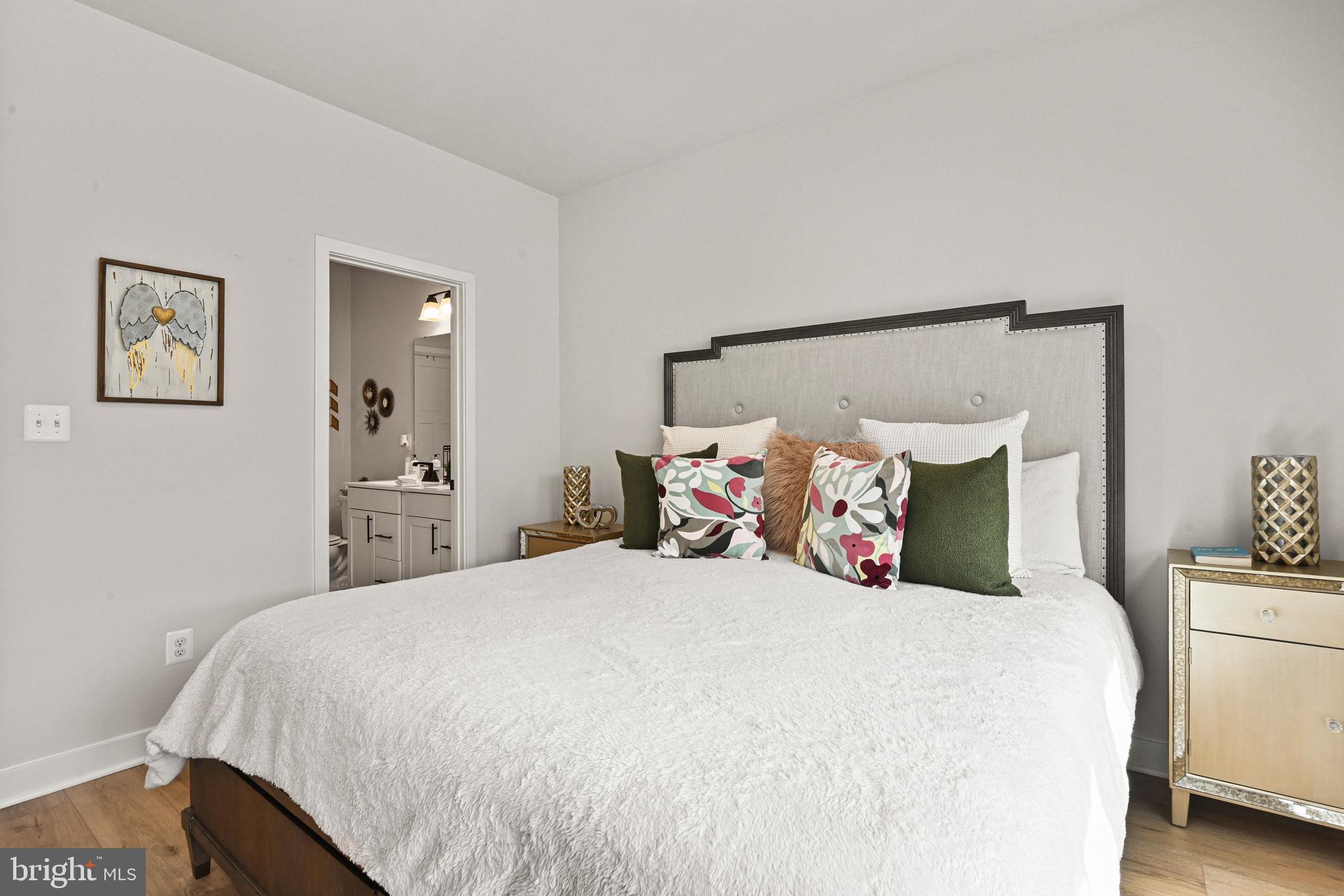 14008 Airfoil Road Herndon, VA 20171 - Photo 23 of 47 a bedroom with a bed and a view of bathroom