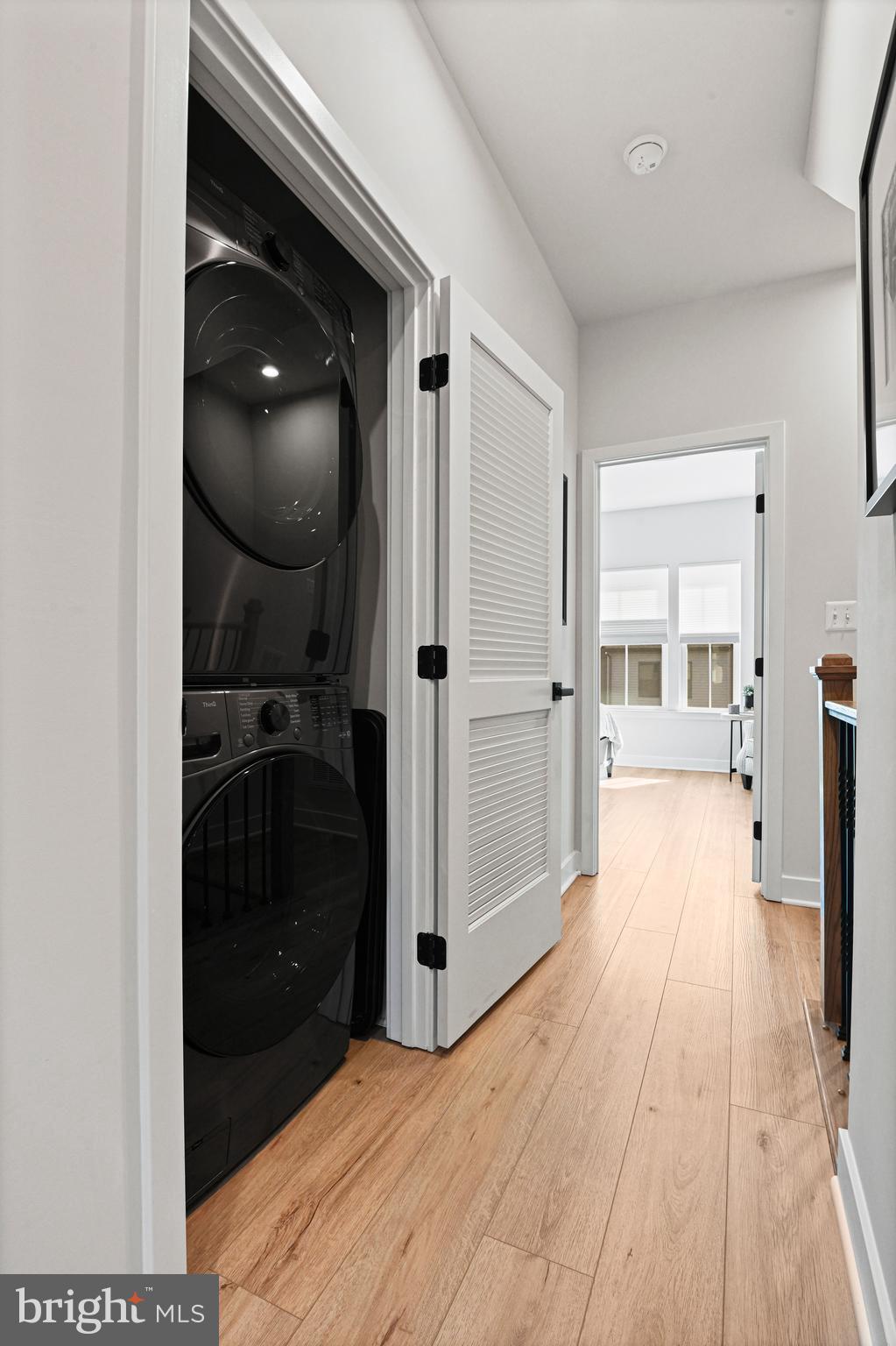 14008 Airfoil Road Herndon, VA 20171 - Photo 28 of 47 a view of hallway with wooden floor and front door