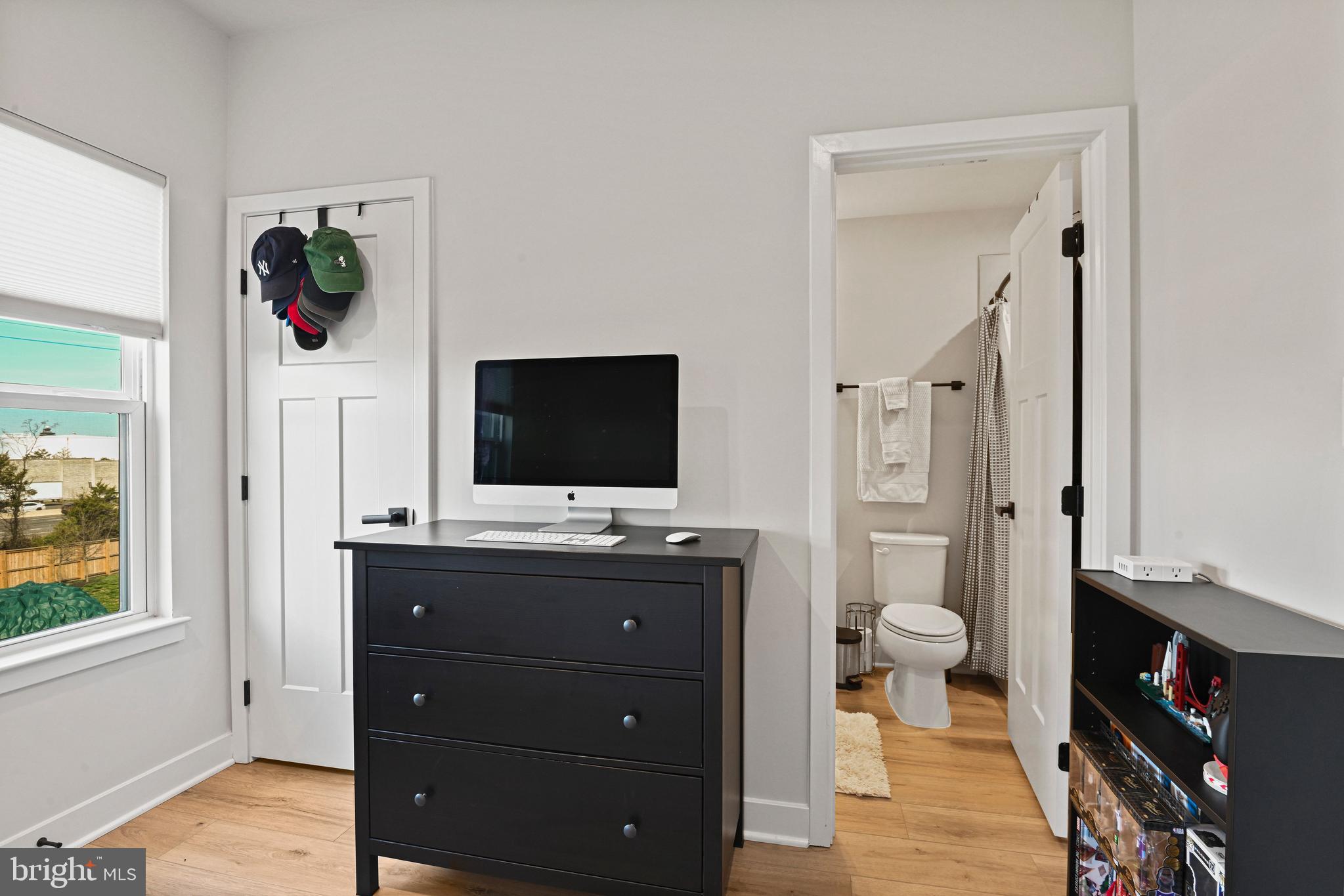 14008 Airfoil Road Herndon, VA 20171 - Photo 30 of 47 a living room with flat screen tv and a dresser