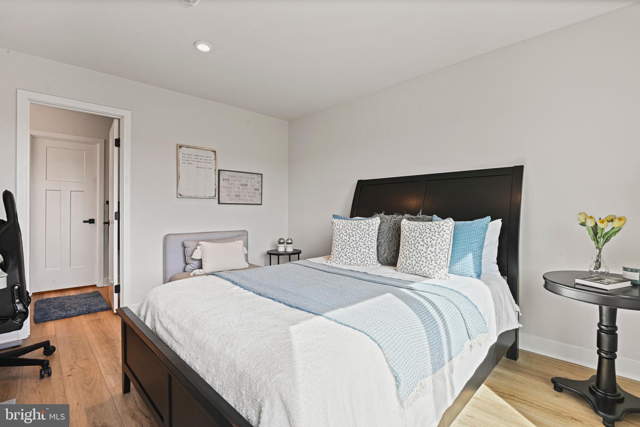 14008 Airfoil Road Herndon, VA 20171 - Photo 34 of 47 a bedroom with a bed and a flat screen tv