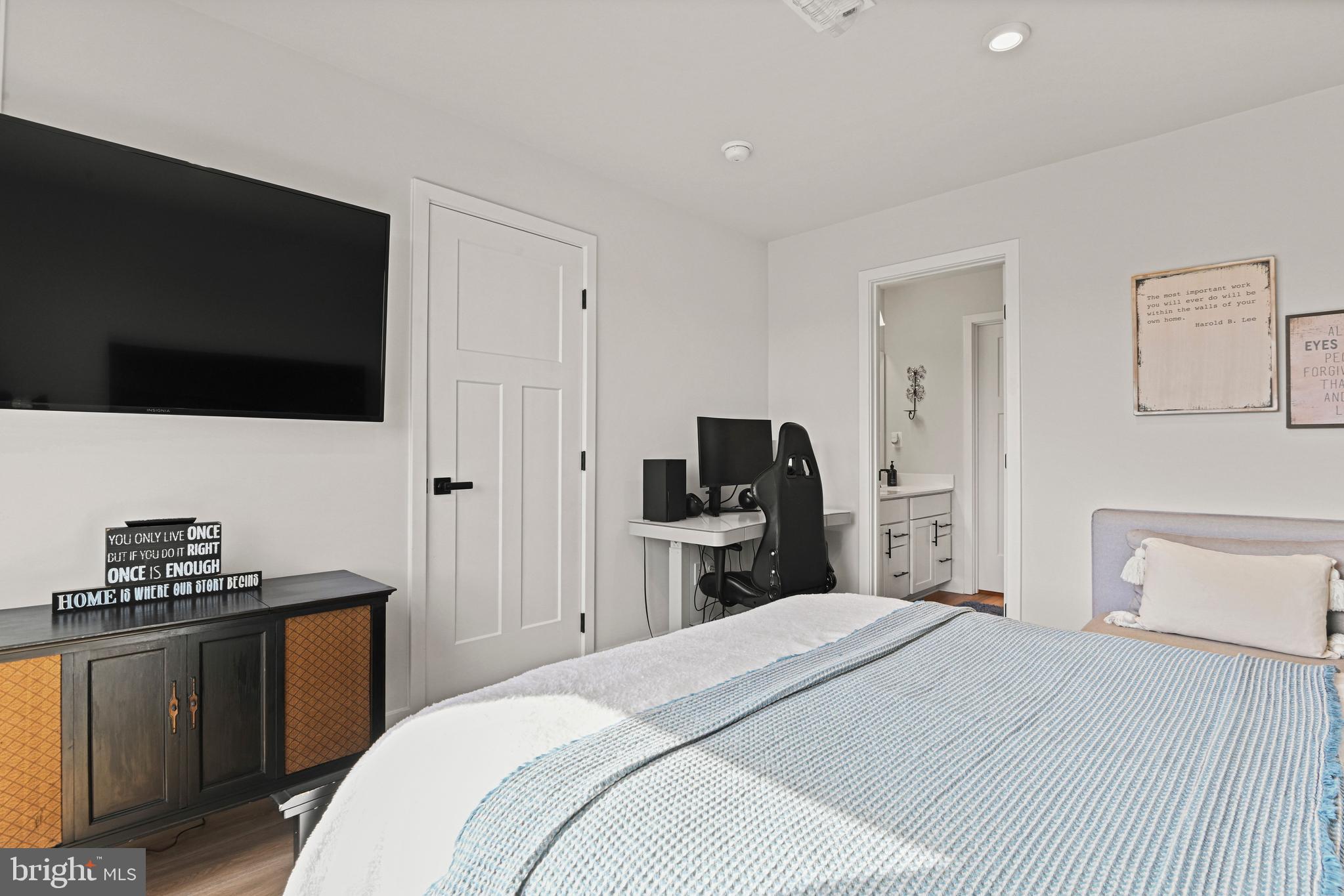 14008 Airfoil Road Herndon, VA 20171 - Photo 35 of 47 a bedroom with a bed and a flat screen tv