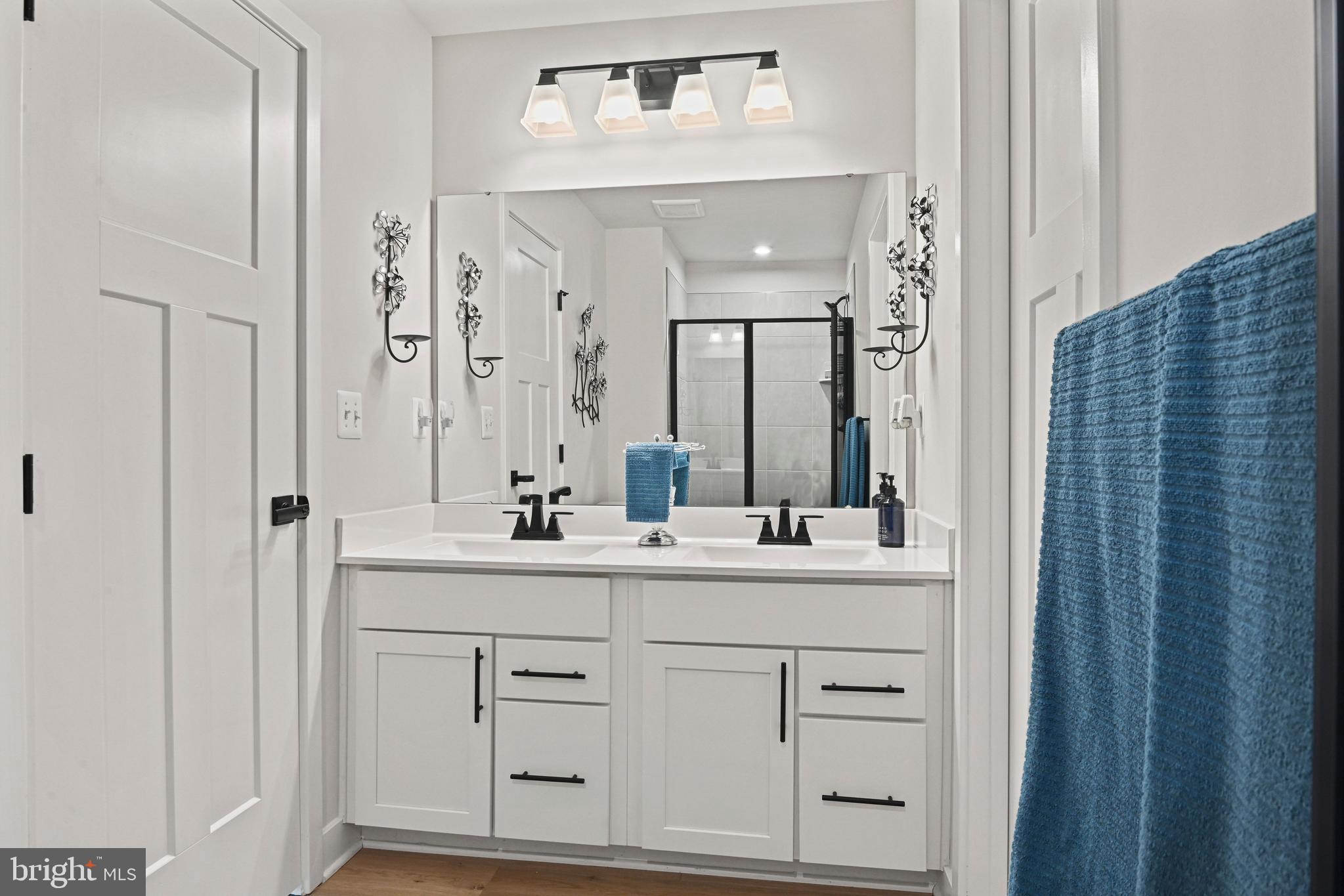 14008 Airfoil Road Herndon, VA 20171 - Photo 39 of 47 a bathroom with a double vanity sink mirror and