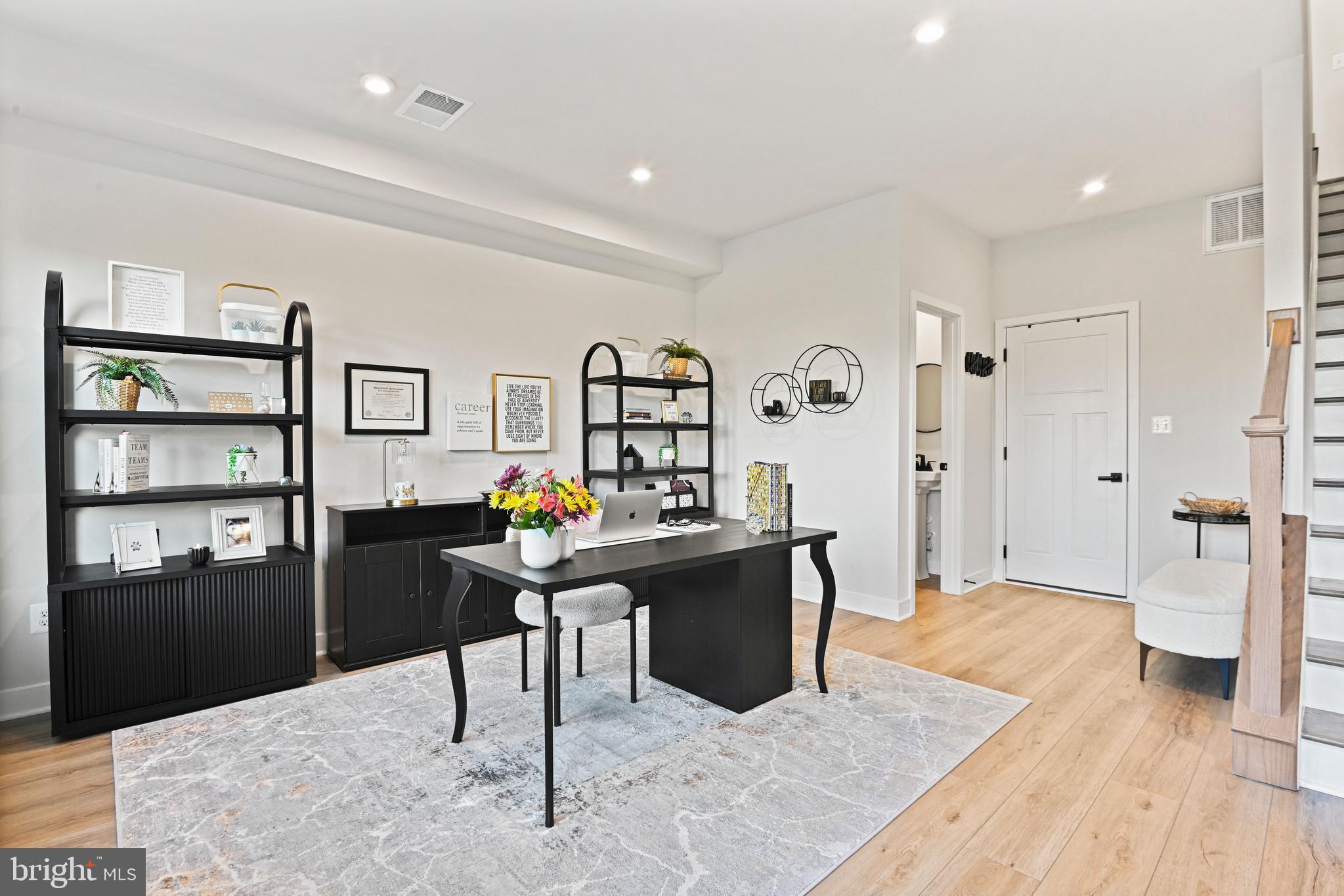14008 Airfoil Road Herndon, VA 20171 - Photo 6 of 47 a view of a workspace with furniture and wooden floor