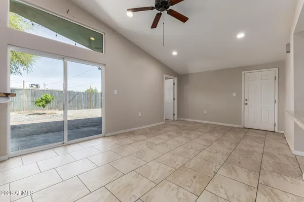 a view of an empty room and window