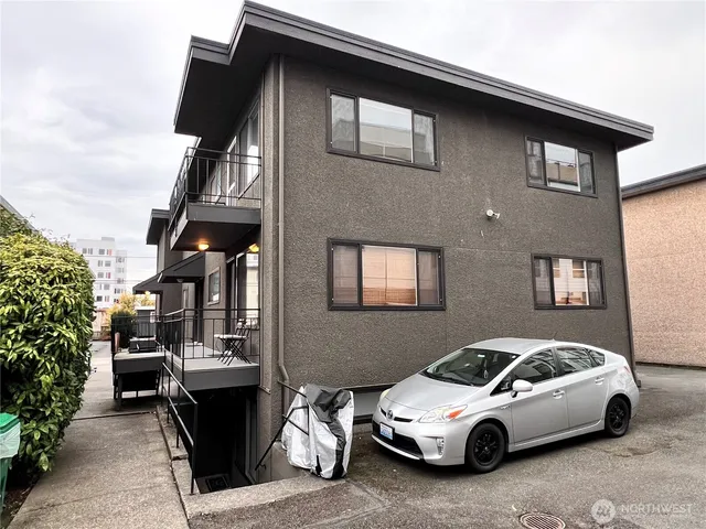 a car parked in front of a house