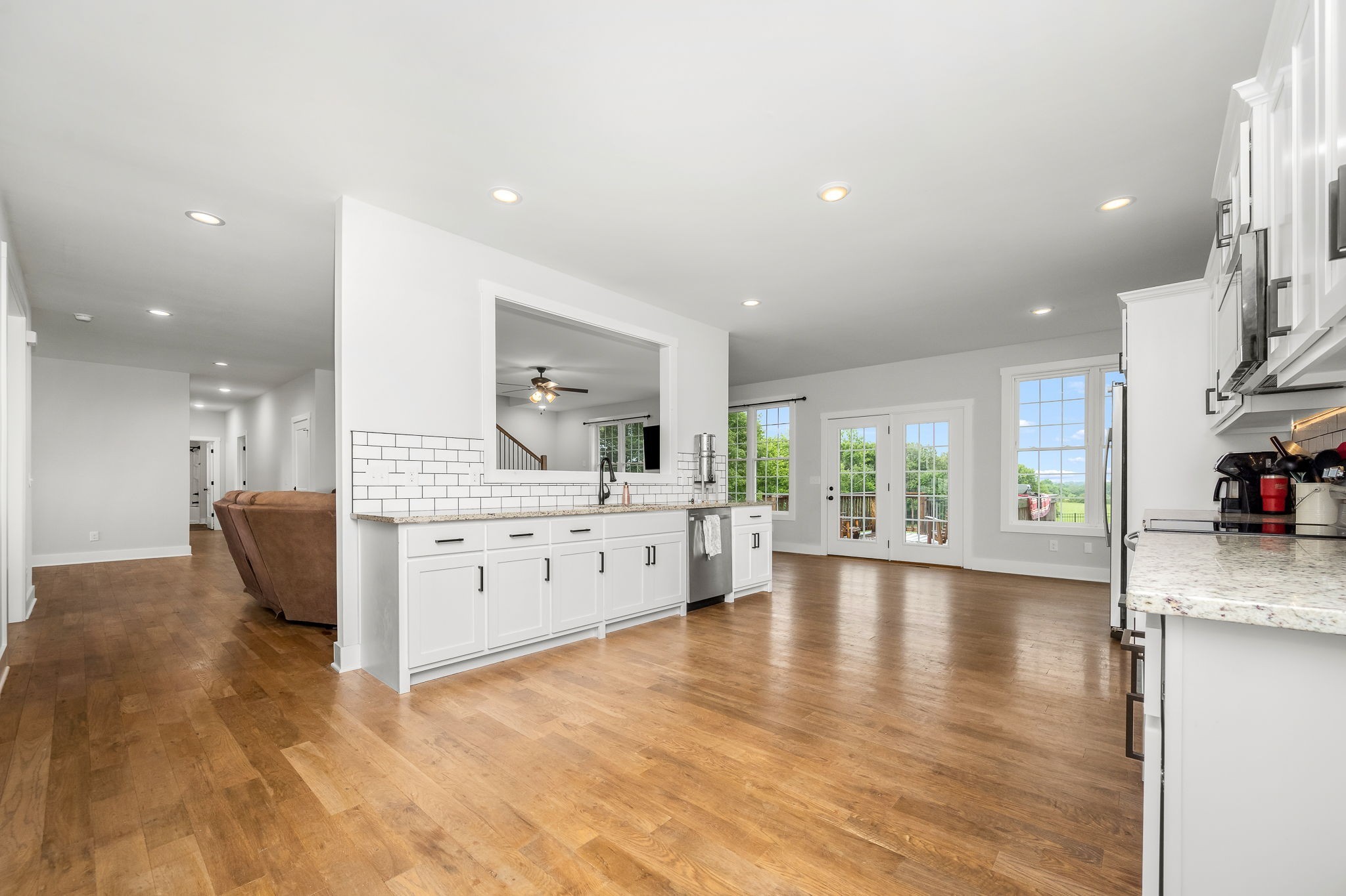 3880 Short Mountain Road Woodbury, TN 37190 - Photo 15 of 56 a large white kitchen with a large window