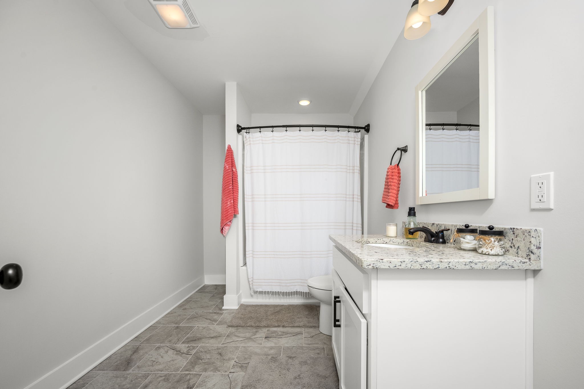 3880 Short Mountain Road Woodbury, TN 37190 - Photo 33 of 56 a bathroom with a granite countertop sink and a mirror