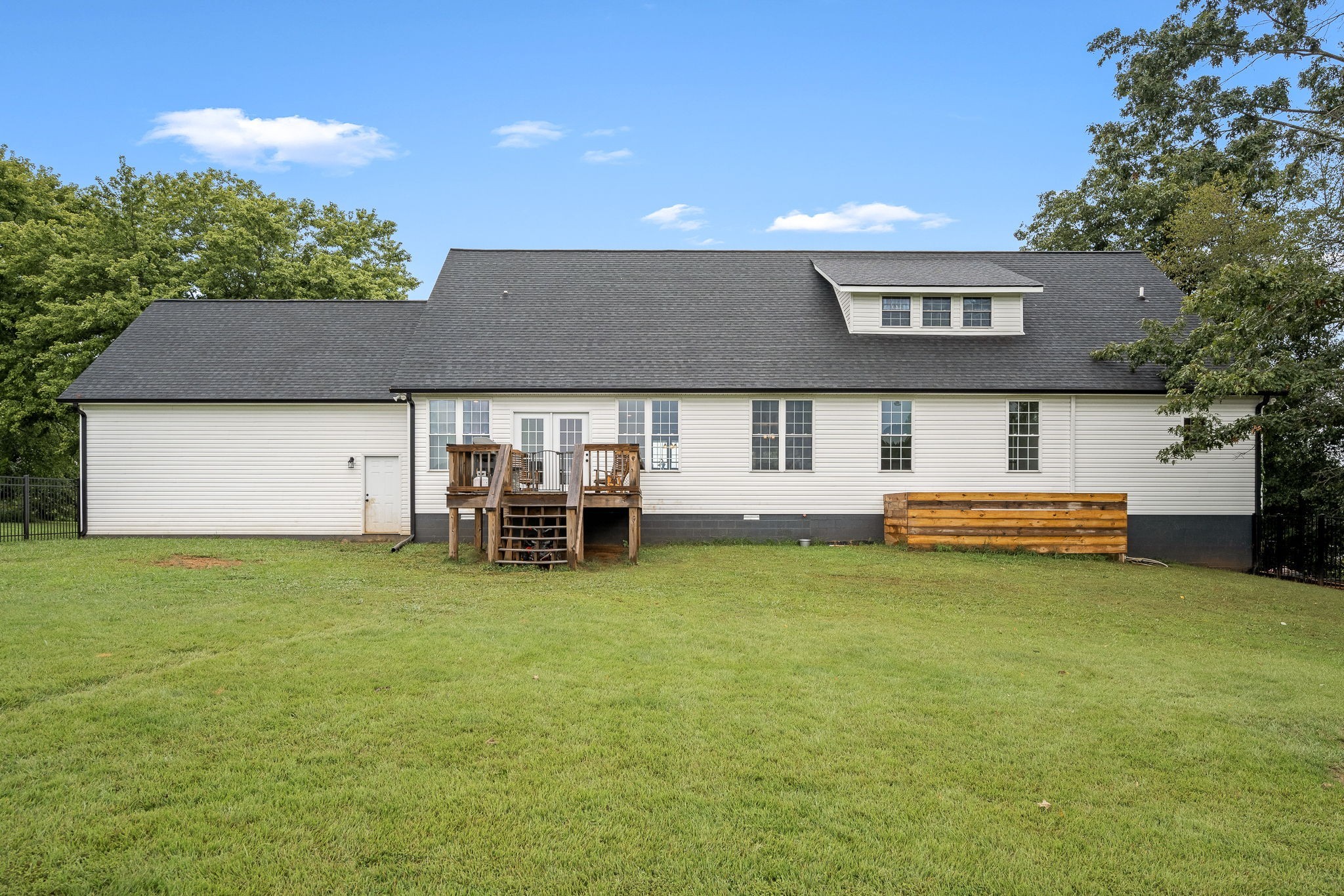 3880 Short Mountain Road Woodbury, TN 37190 - Photo 46 of 56 a view of a house with swimming pool and a yard