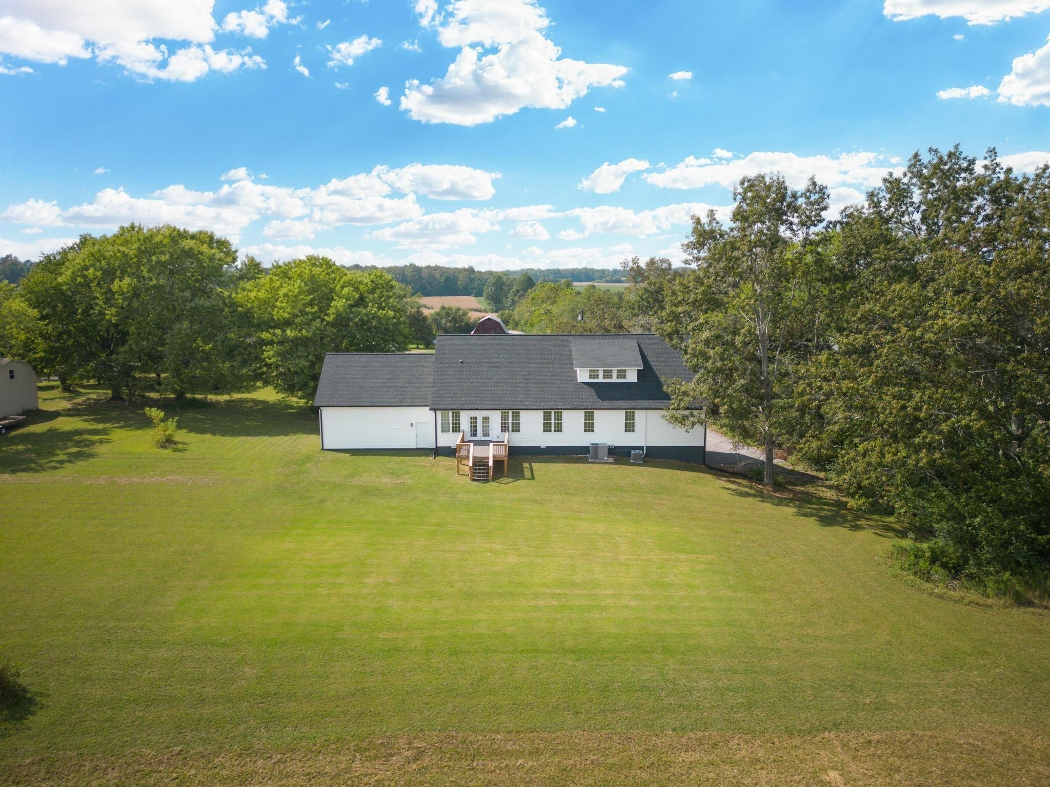 3880 Short Mountain Road Woodbury, TN 37190 - Photo 49 of 56 a view of a swimming pool with an ocean view