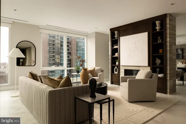 a living room with furniture and a window