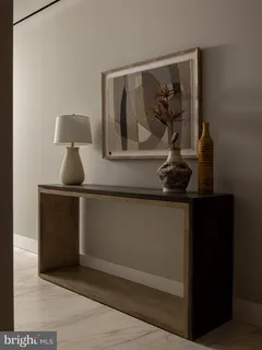 a view of front door with wooden floor