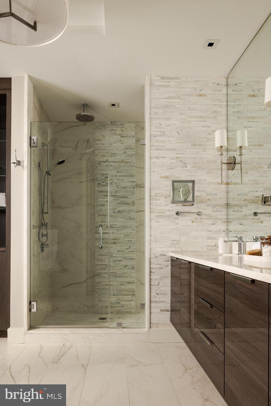 500 Walnut Street, Unit 701 Philadelphia, PA 19106 - Photo 19 of 32 a bathroom with a shower and a sink