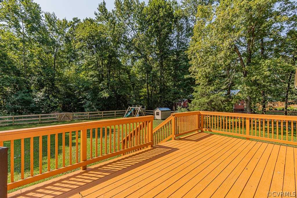 7421 River Road Hanover, VA 23069 - Photo 21 of 23 a view of balcony with wooden floor and fence