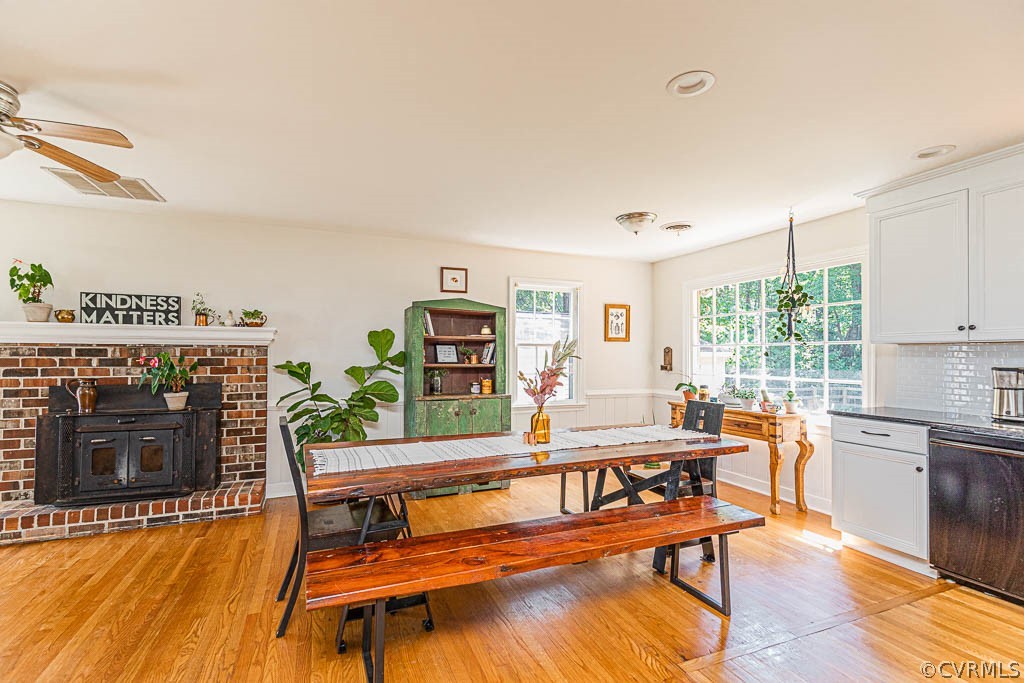 7421 River Road Hanover, VA 23069 - Photo 7 of 23 a living room with furniture a fireplace and wooden floor