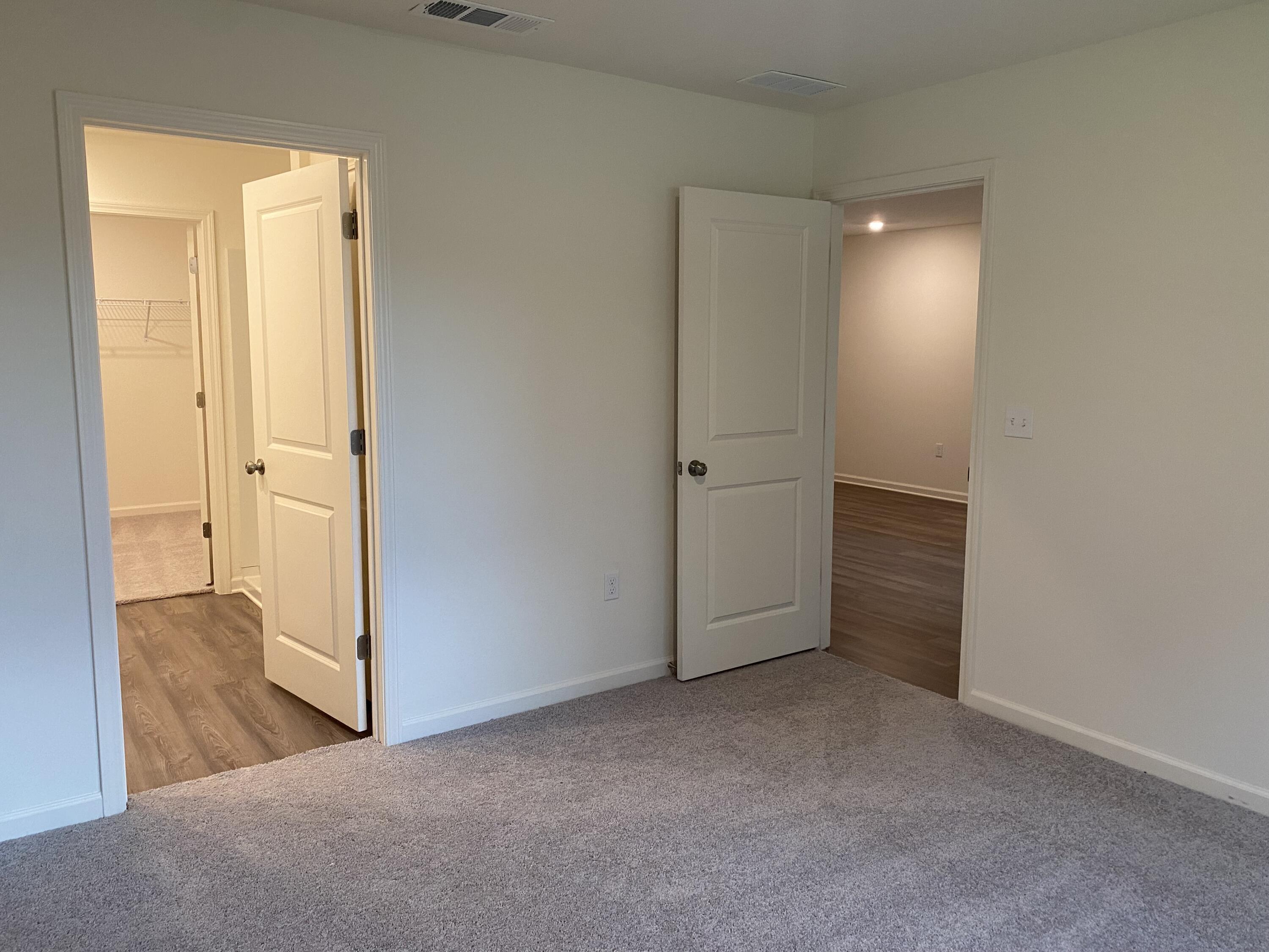128 Squirrel Road DeFuniak Springs, FL 32433 - Photo 7 of 12 an empty room with windows and closet