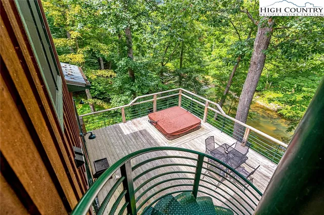 a view of balcony with furniture