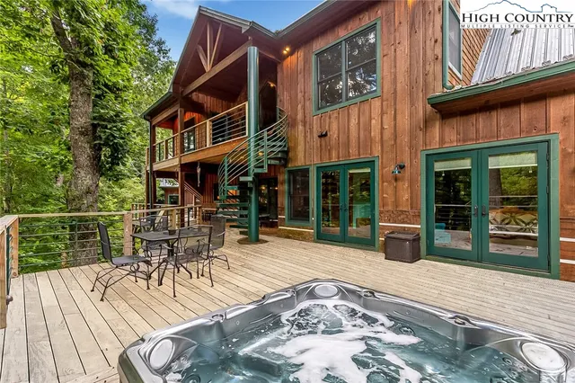 a view of a dinning table and chairs in the patio