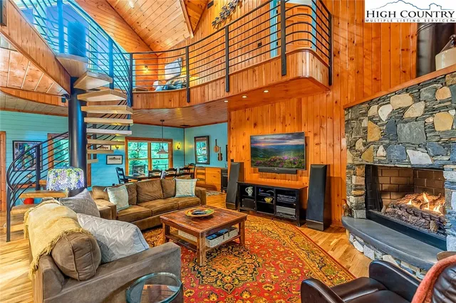 a outdoor space with patio furniture and a fireplace