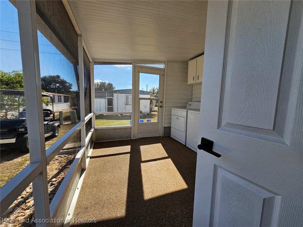 8065 Von Maxcy Road Sebring, FL 33870 - Photo 23 of 37 Laundry Area /Rear Porch is off Master Bedroom Suite and could be a lock-out.
