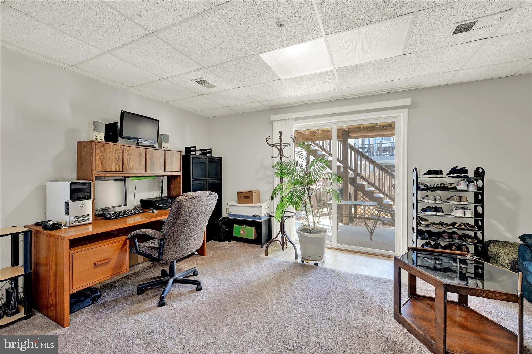 660 Hunting Fields Road Middle River, MD 21220 - Photo 21 of 38 1st floor office/den / family room with patio view