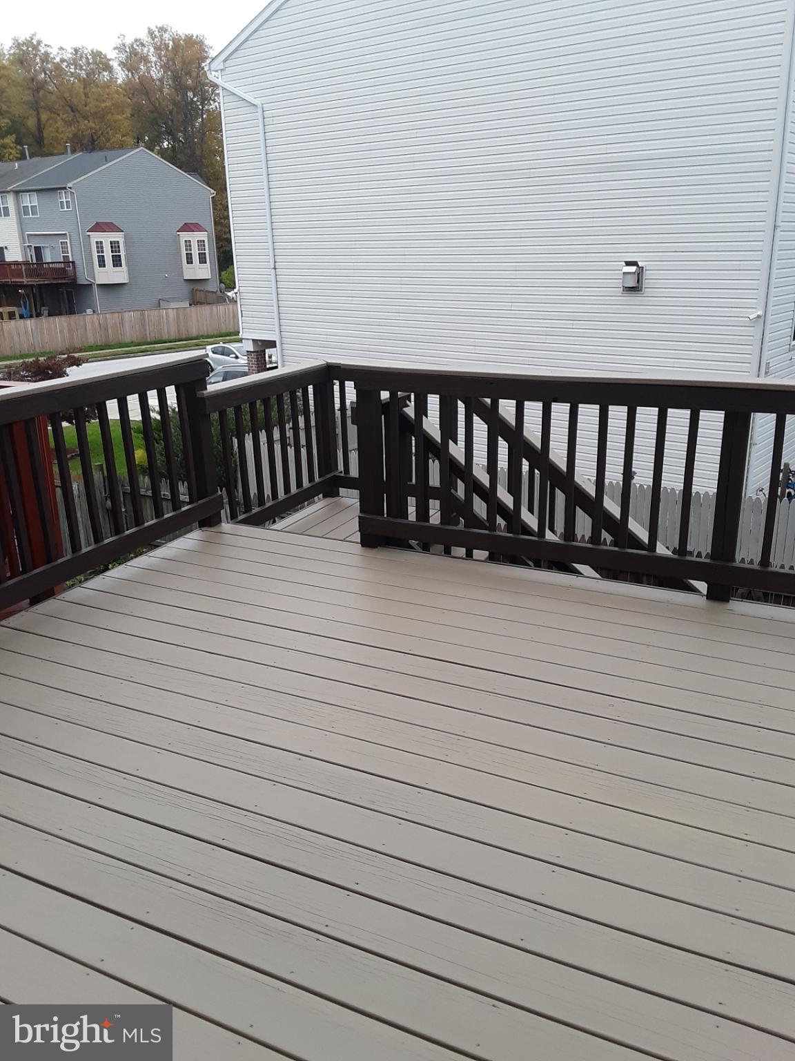 660 Hunting Fields Road Middle River, MD 21220 - Photo 25 of 38 Spacious deck perfect for outdoor gatherings.