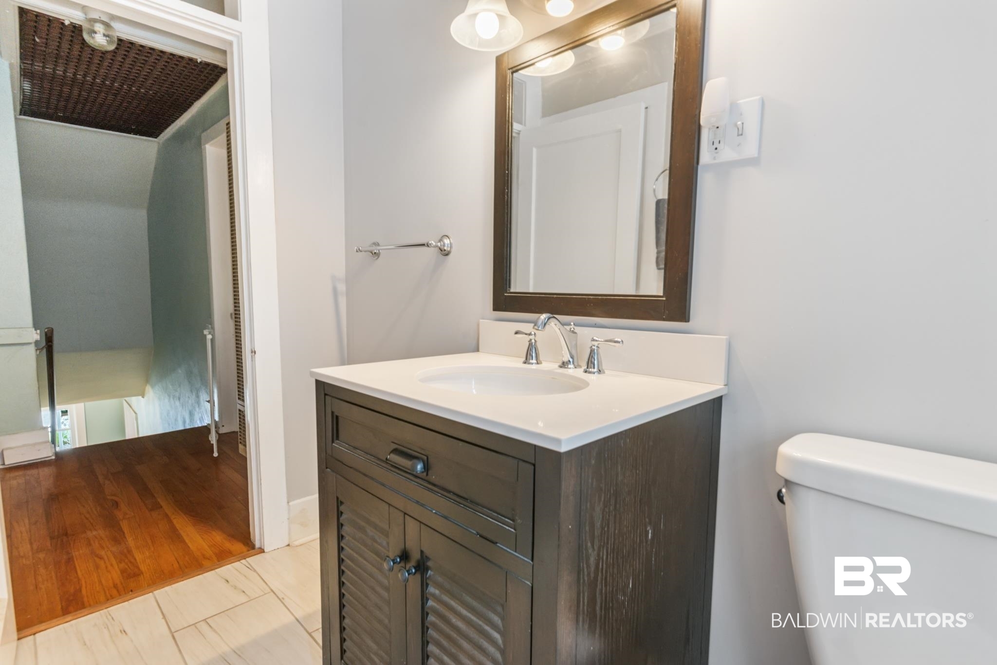 114 Crenshaw Street Mobile, AL 36606 - Photo 40 of 49 Bathroom with hardwood / wood-style floors, vanity, and toilet