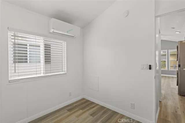 a view of a room that has a window in it