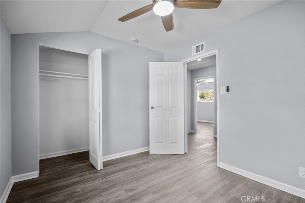 1791 Sitka Avenue Simi Valley, CA 93063 - Photo 38 of 44 a view of an empty room with wooden floor