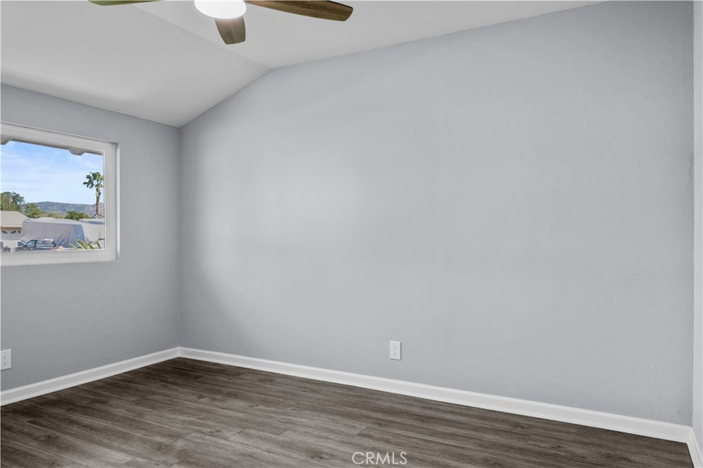 1791 Sitka Avenue Simi Valley, CA 93063 - Photo 41 of 44 a view of an empty room with wooden floor and a window