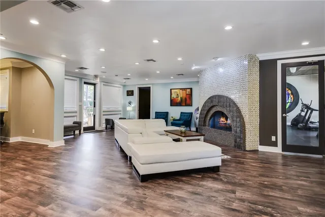 a living room with furniture and a table