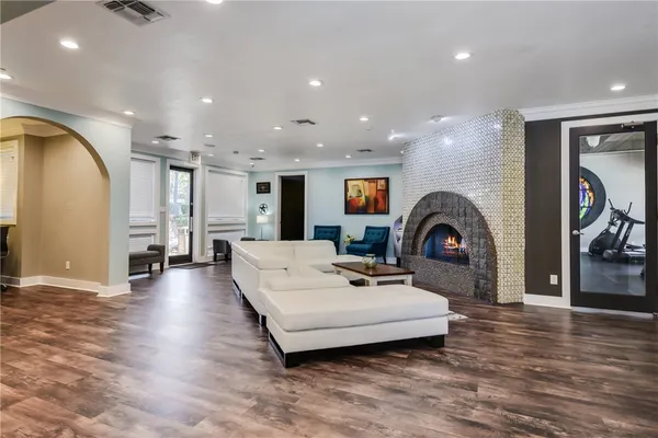 a living room with furniture and a table