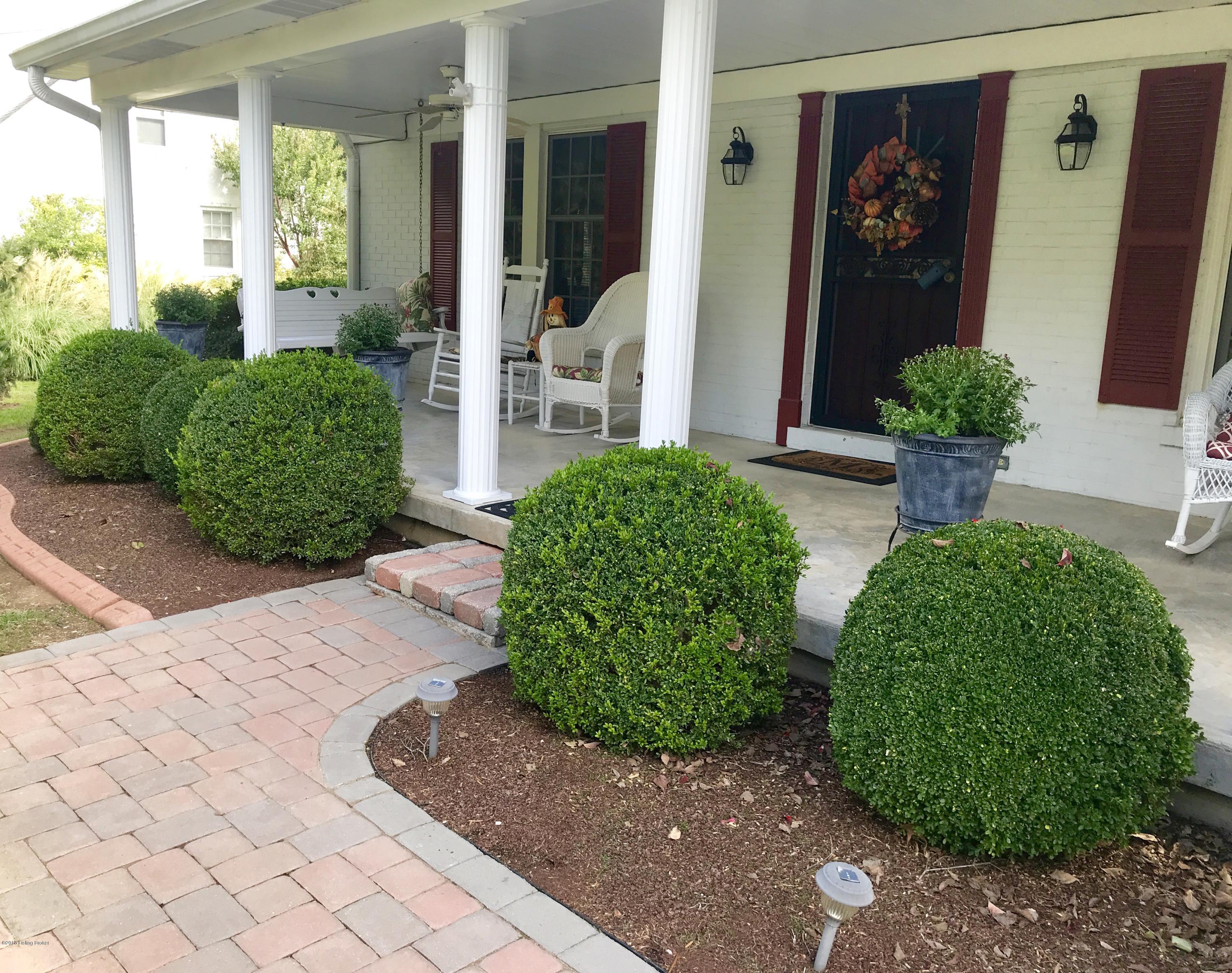 209 North Chadwick Road Louisville, KY 40222 - Photo 4 of 54 Covered Front Porch with Decorative Walkway