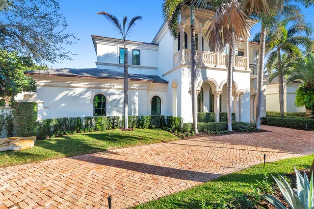 a view of a building with a yard