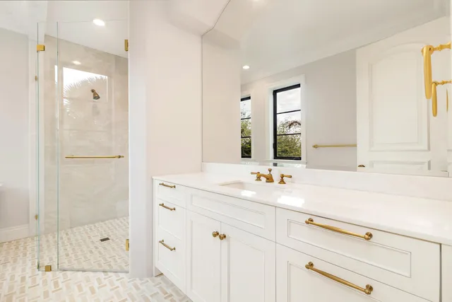 a view of a dining room with furniture a chandelier and garden