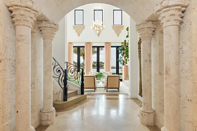 a view of an outside dining space with furniture window and outside view