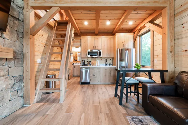 a view of entryway with wooden floor and stairs