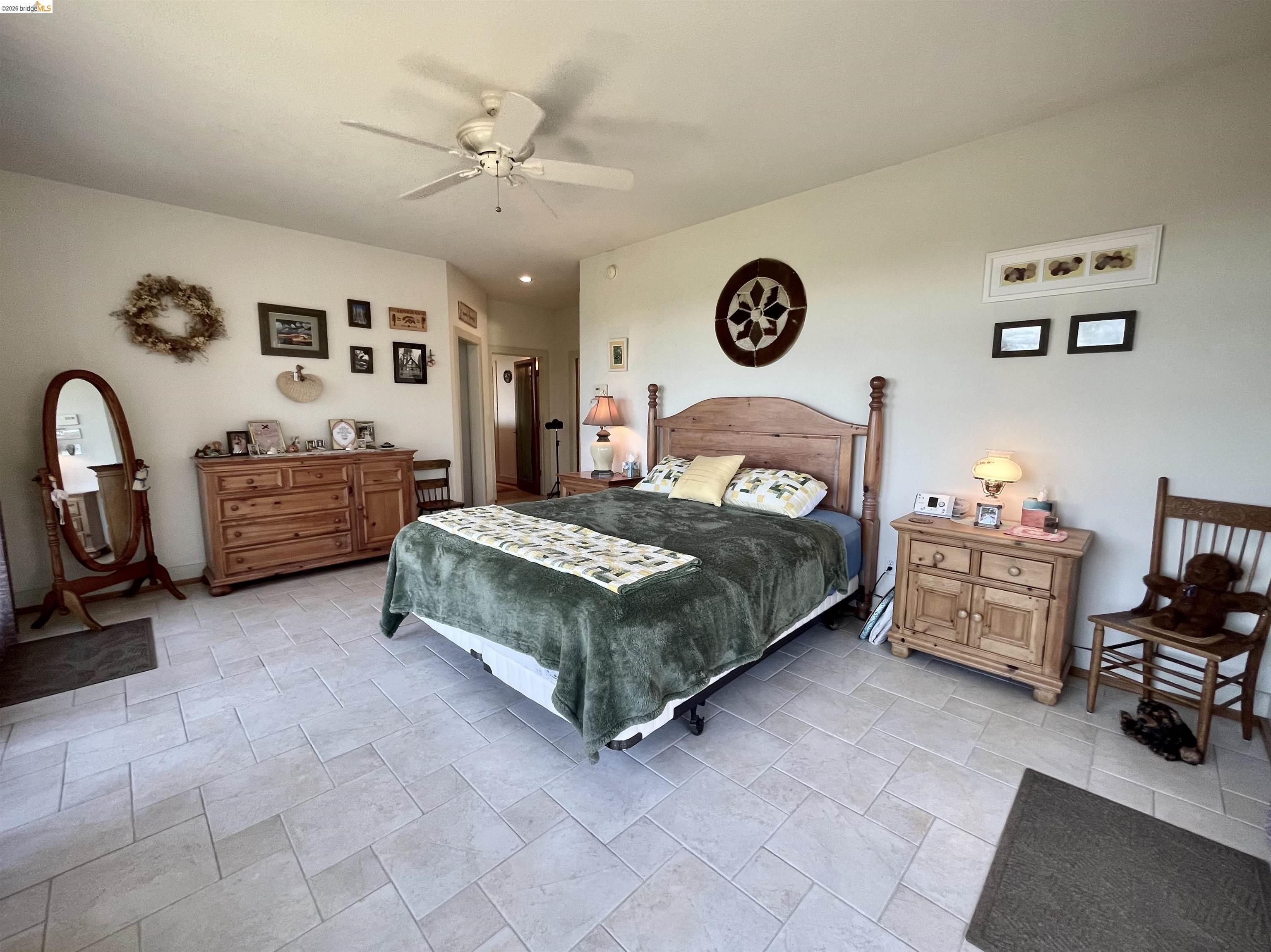 18288 Lambert Lake Road Sonora, CA 95370 - Photo 22 of 55 Bedroom featuring ceiling fan