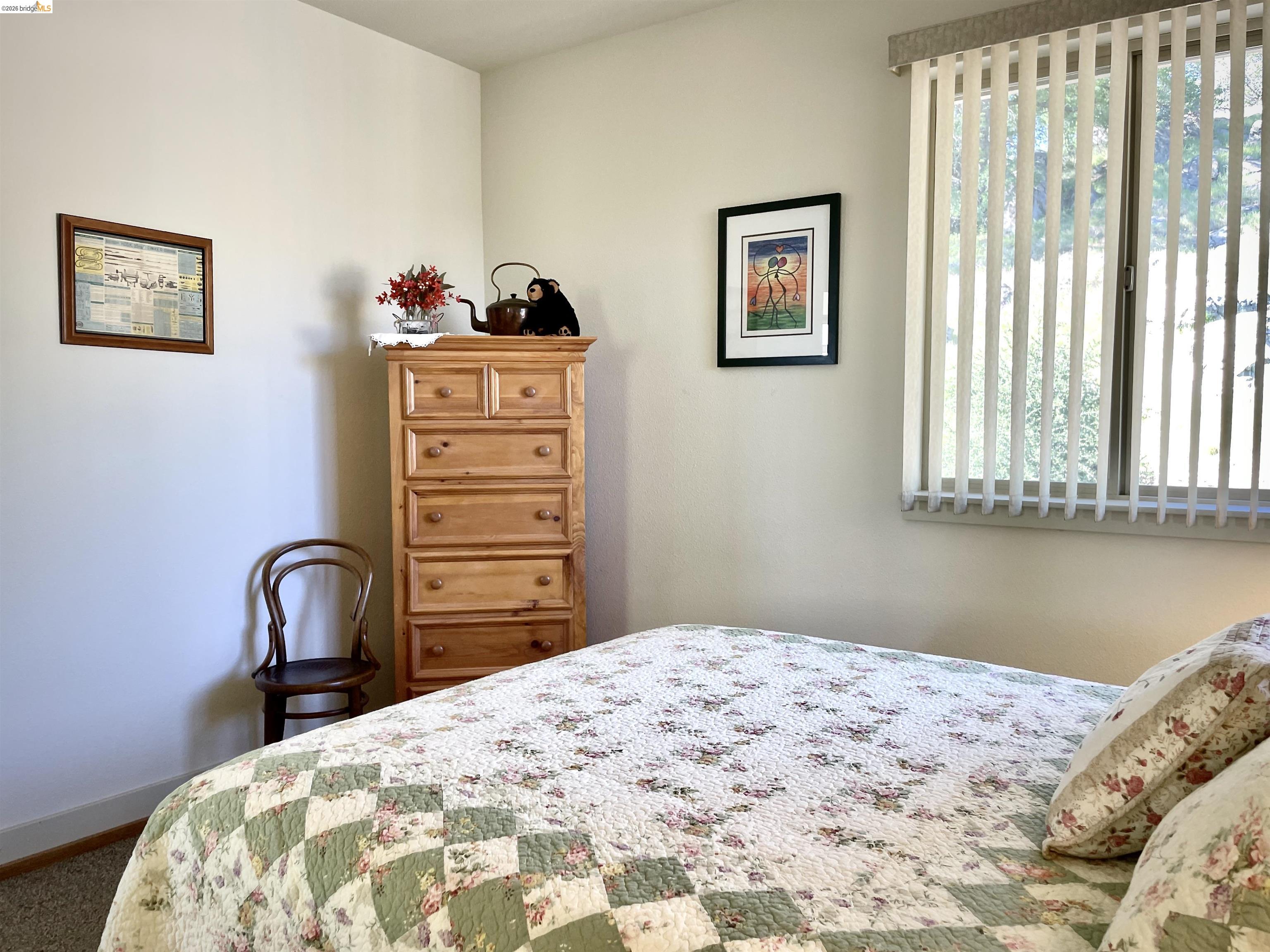 18288 Lambert Lake Road Sonora, CA 95370 - Photo 30 of 55 Carpeted bedroom with baseboards