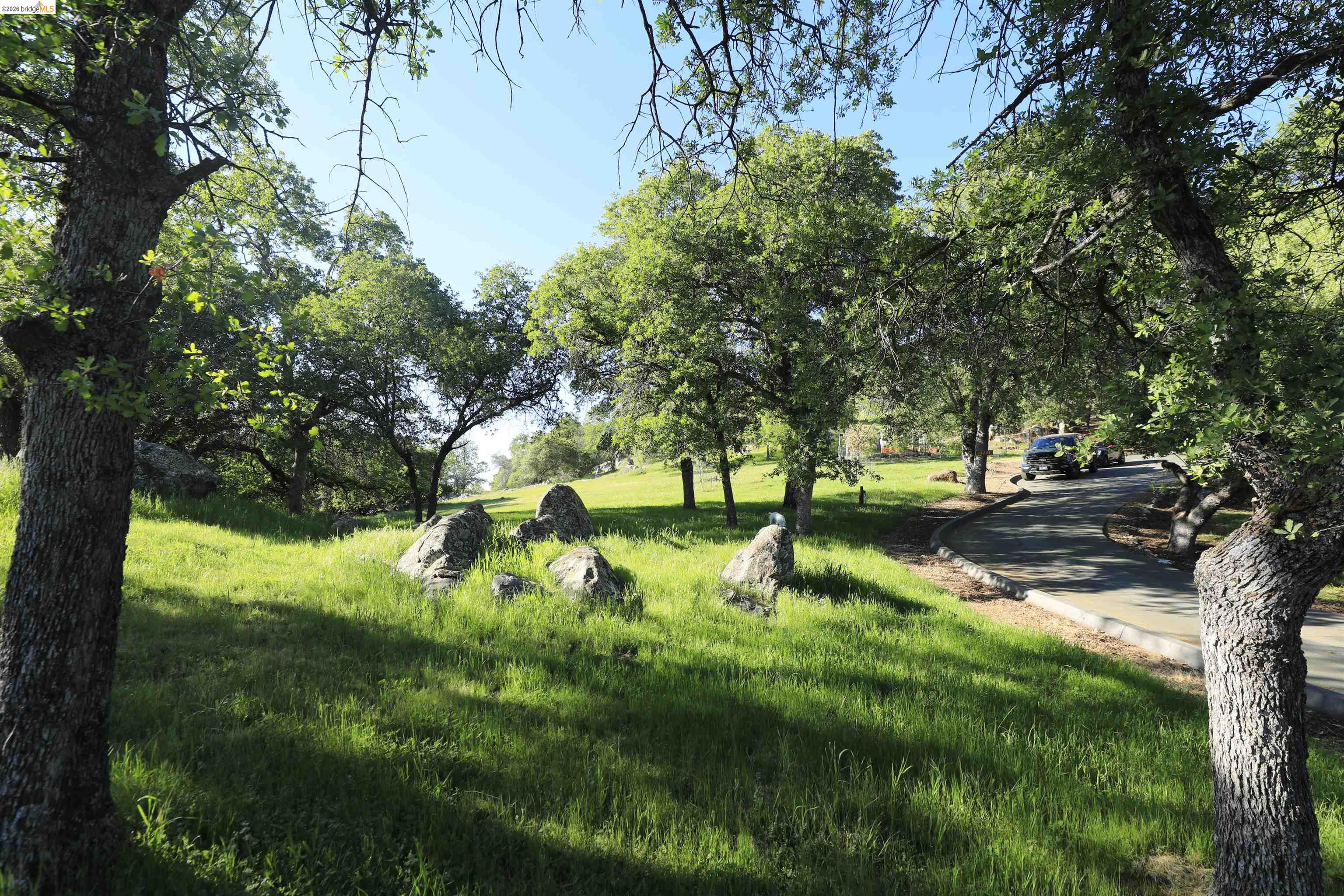 18288 Lambert Lake Road Sonora, CA 95370 - Photo 51 of 55 Surrounding community with view of wooded area
