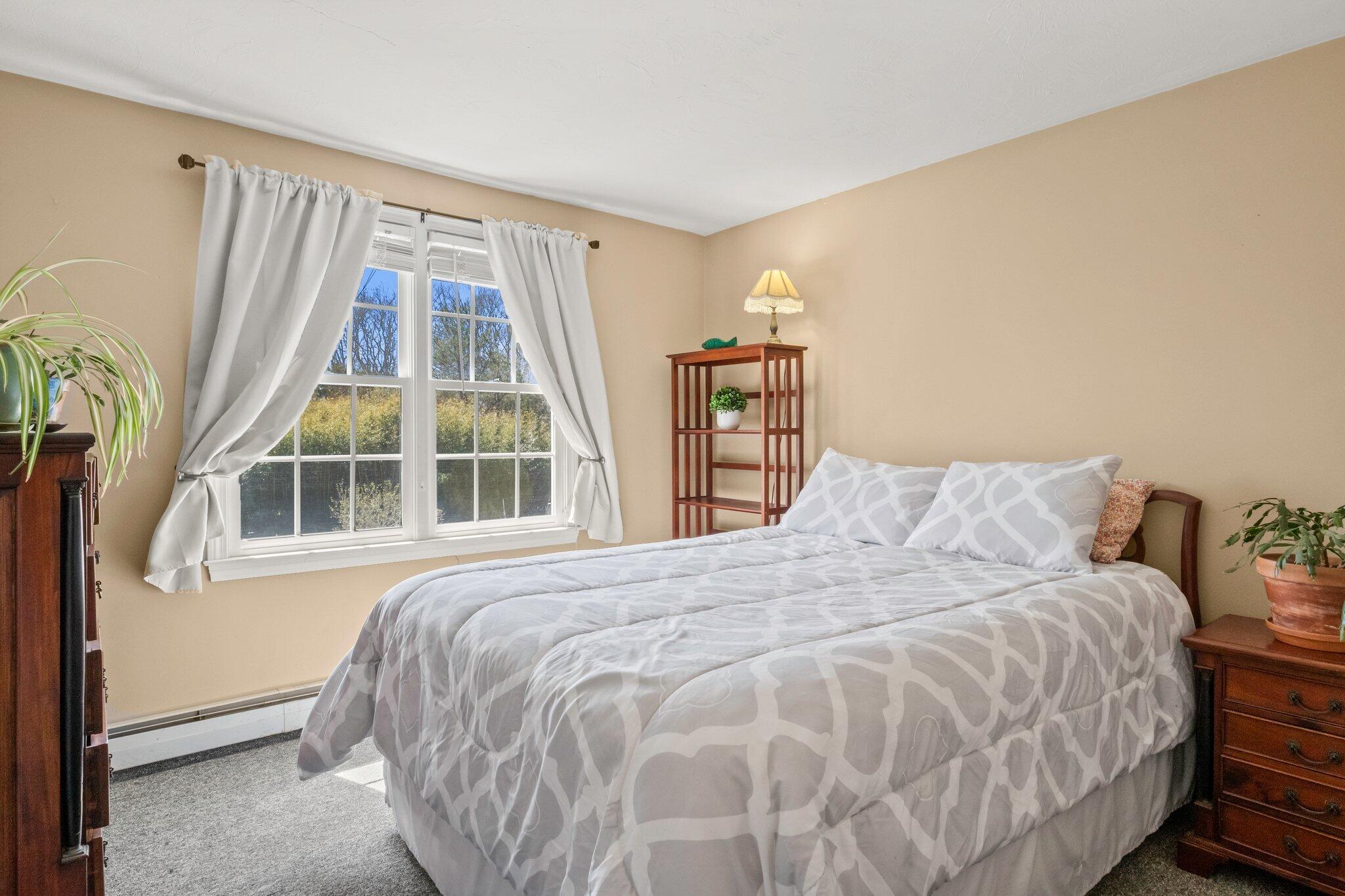 9 Forest Road Forestdale, MA 02644 - Photo 13 of 29 a bedroom with a bed and a window