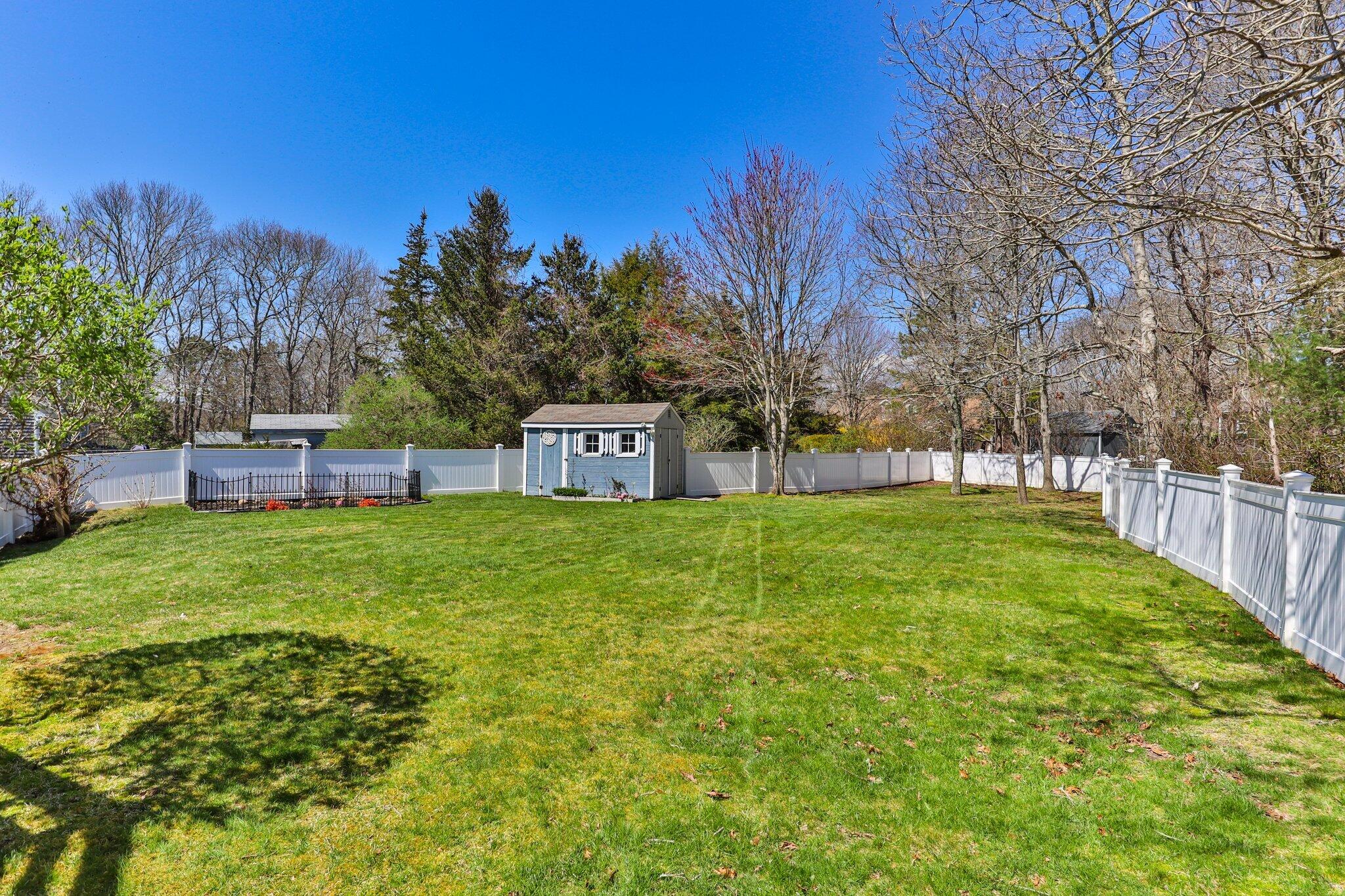 9 Forest Road Forestdale, MA 02644 - Photo 18 of 29 a green field with lots of trees in it