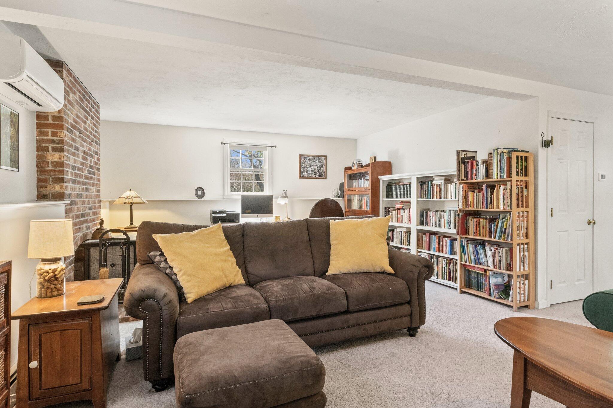 9 Forest Road Forestdale, MA 02644 - Photo 20 of 29 a living room with furniture and a book shelf