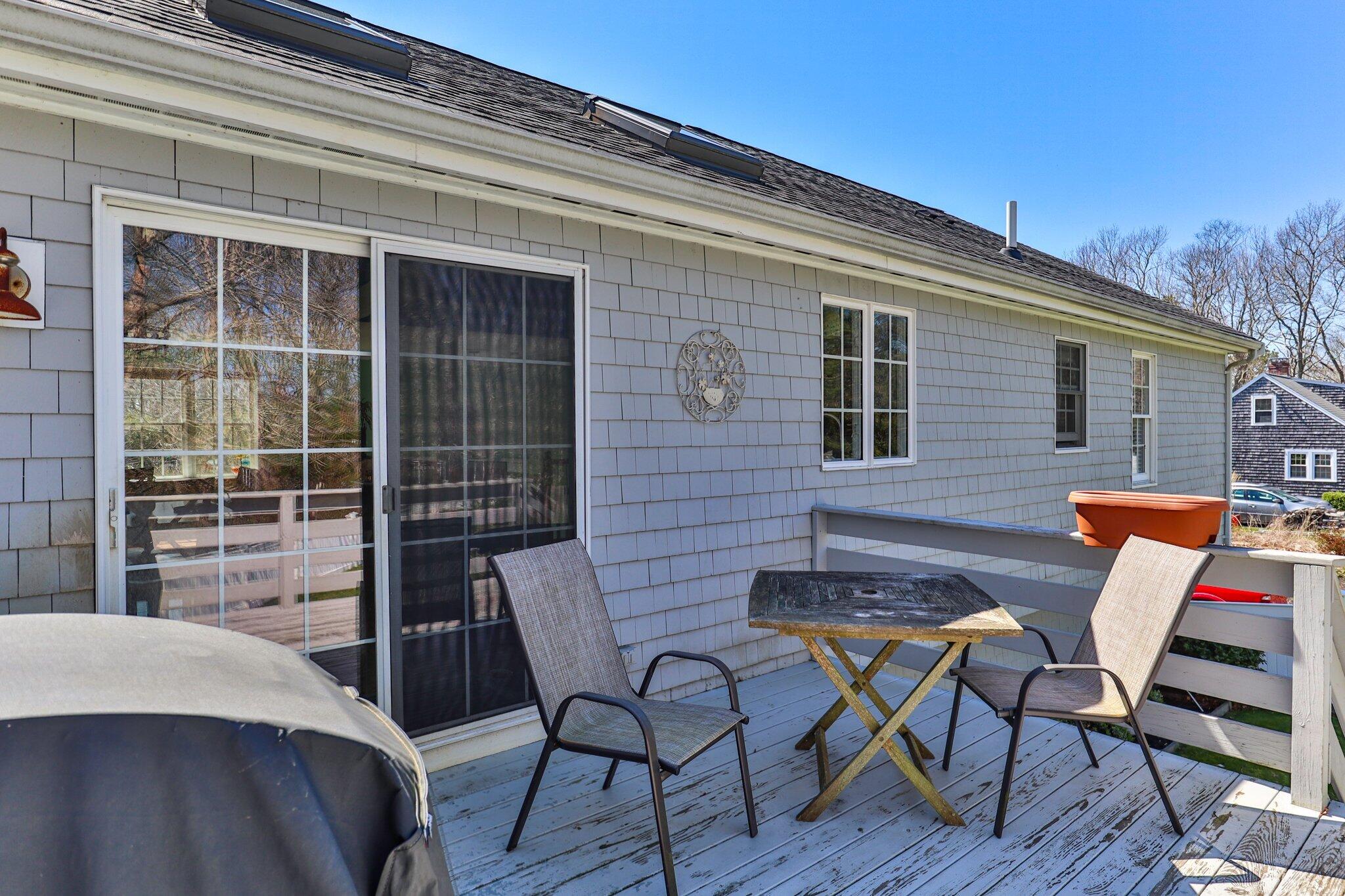 9 Forest Road Forestdale, MA 02644 - Photo 22 of 29 a backyard of a house with table and chairs