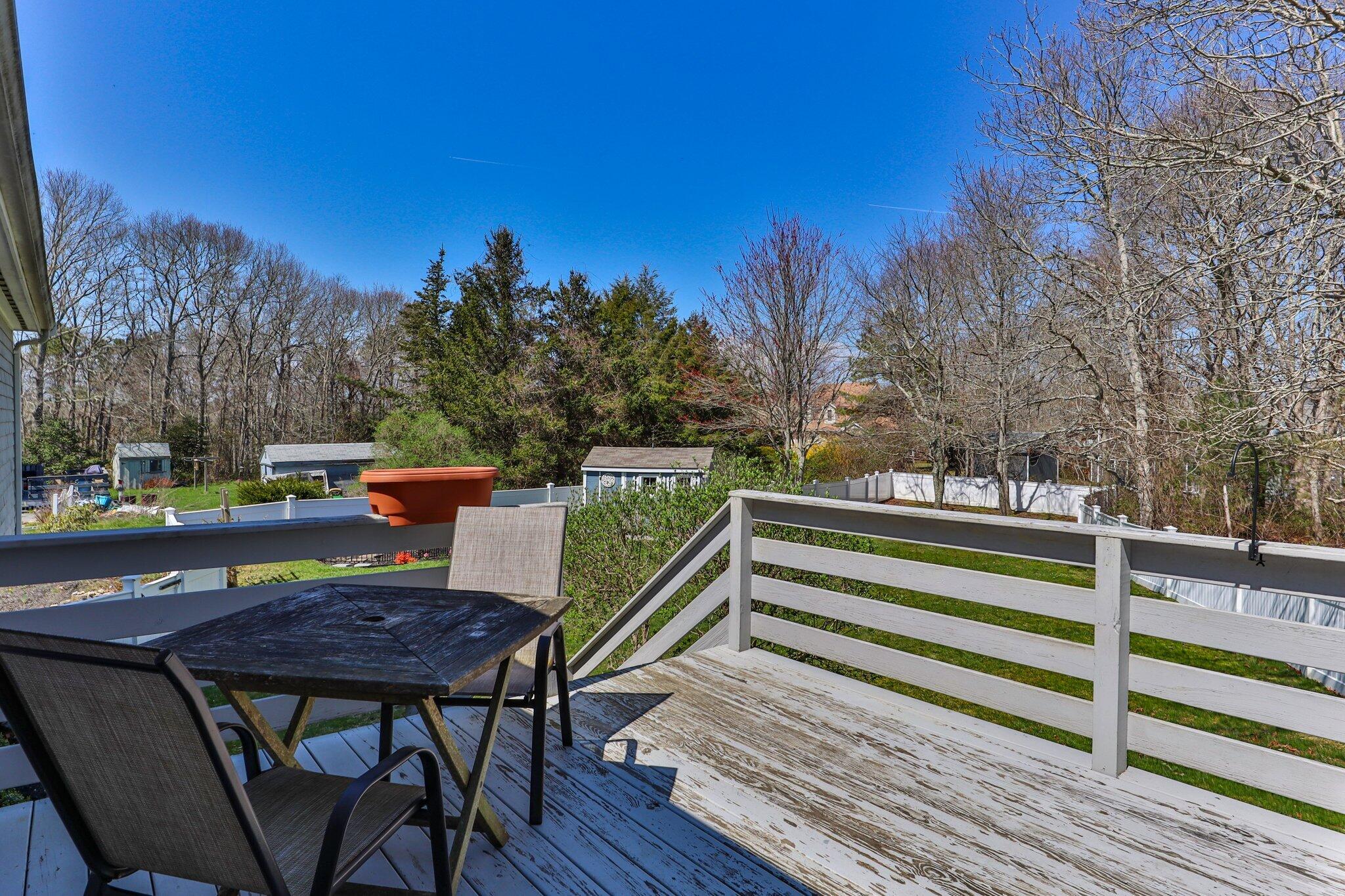 9 Forest Road Forestdale, MA 02644 - Photo 23 of 29 a view of a chairs and table on the deck