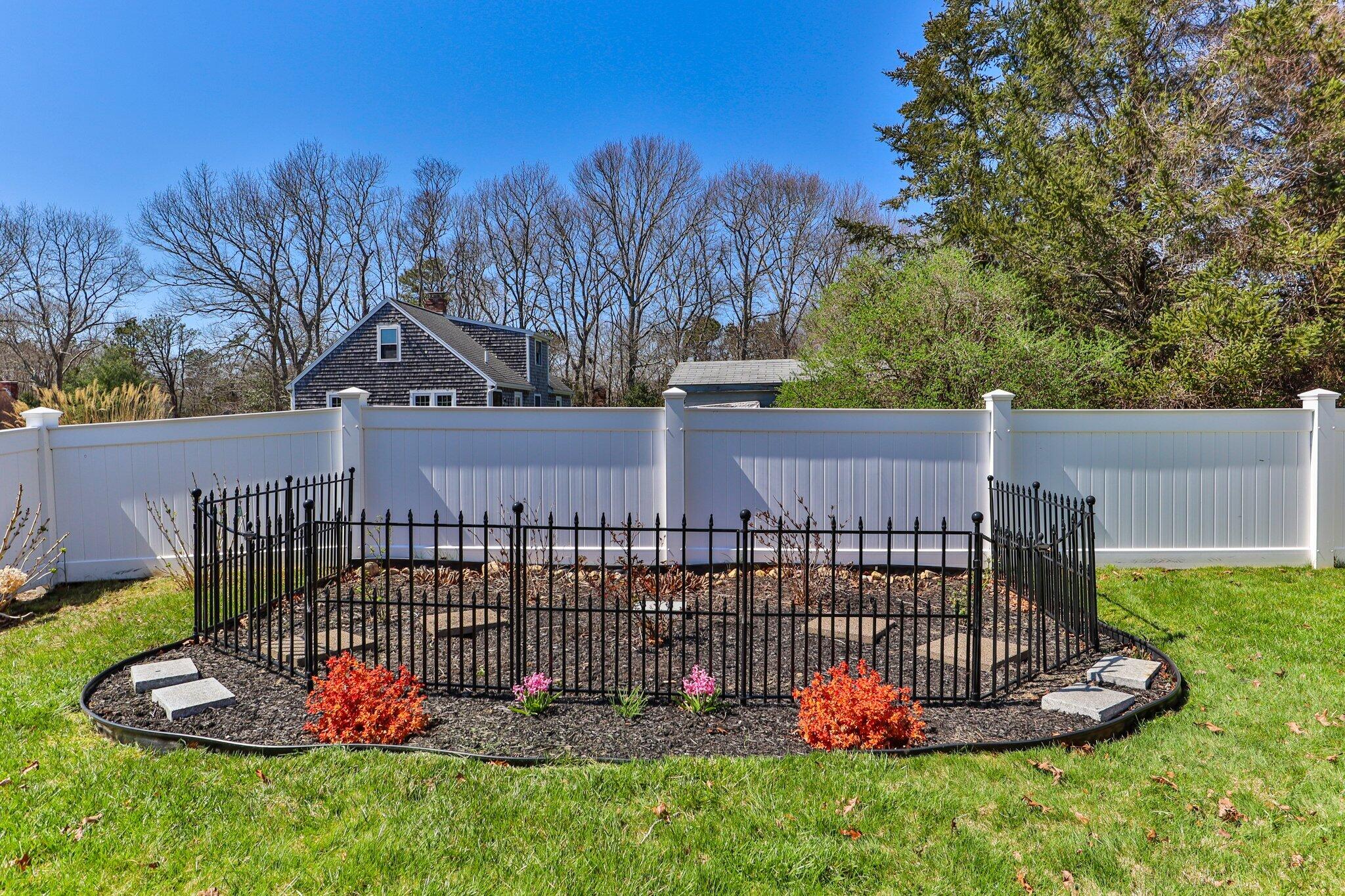 9 Forest Road Forestdale, MA 02644 - Photo 26 of 29 a view of a backyard with plants and large tree