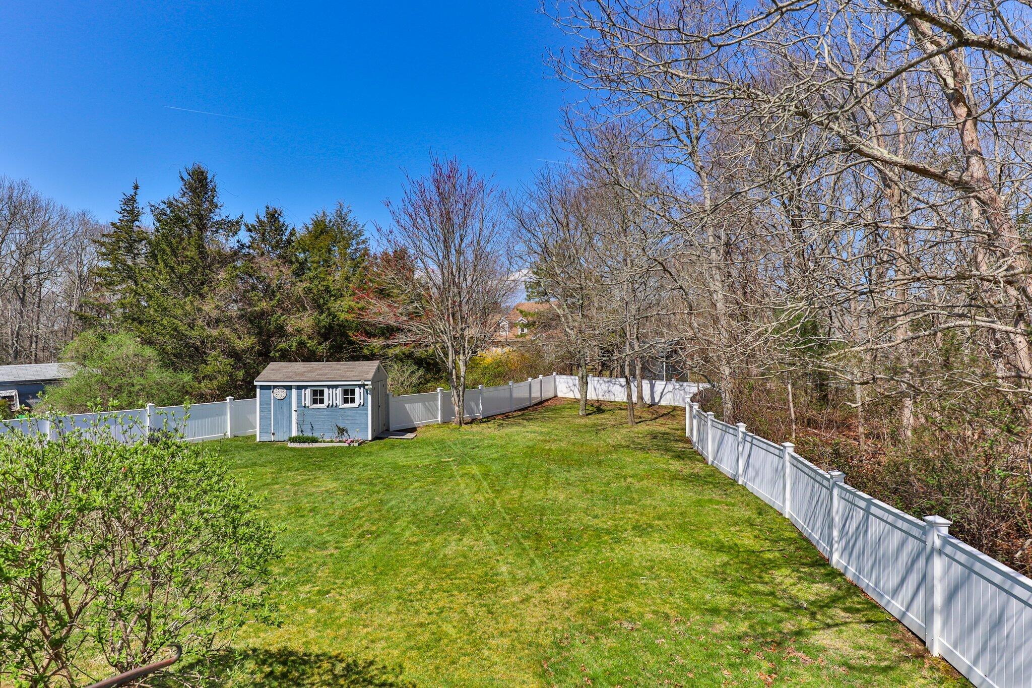 9 Forest Road Forestdale, MA 02644 - Photo 27 of 29 a view of a yard with an trees