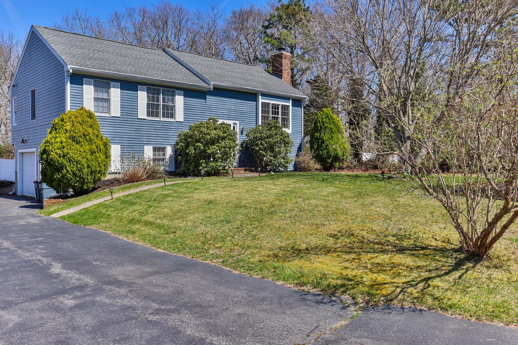 9 Forest Road Forestdale, MA 02644 - Photo 29 of 29 a view of a house with a yard and plants