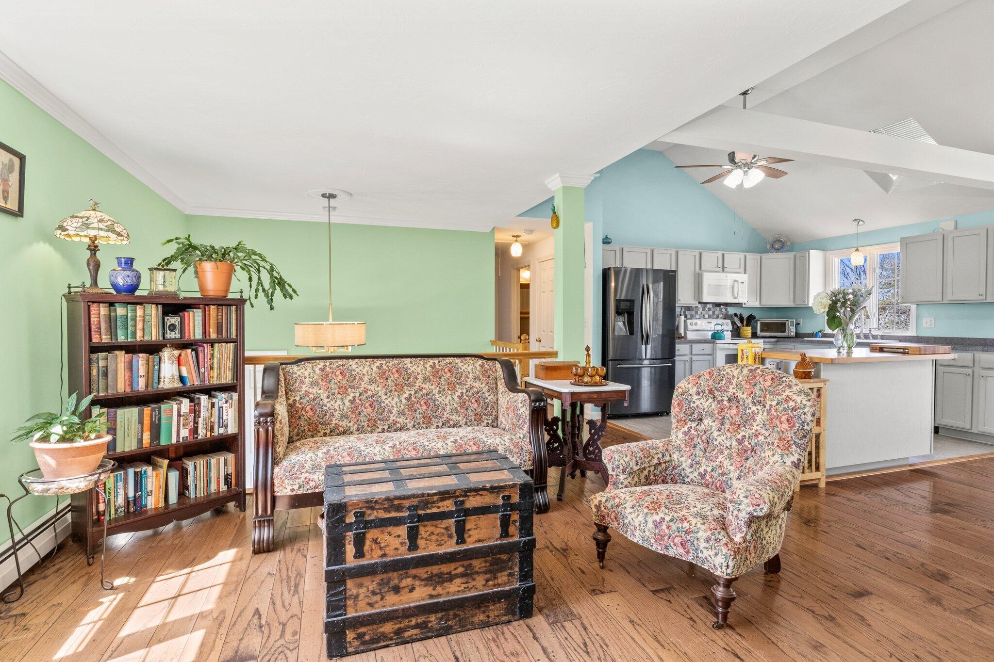 9 Forest Road Forestdale, MA 02644 - Photo 7 of 29 a living room with furniture kitchen view and a bookshelf